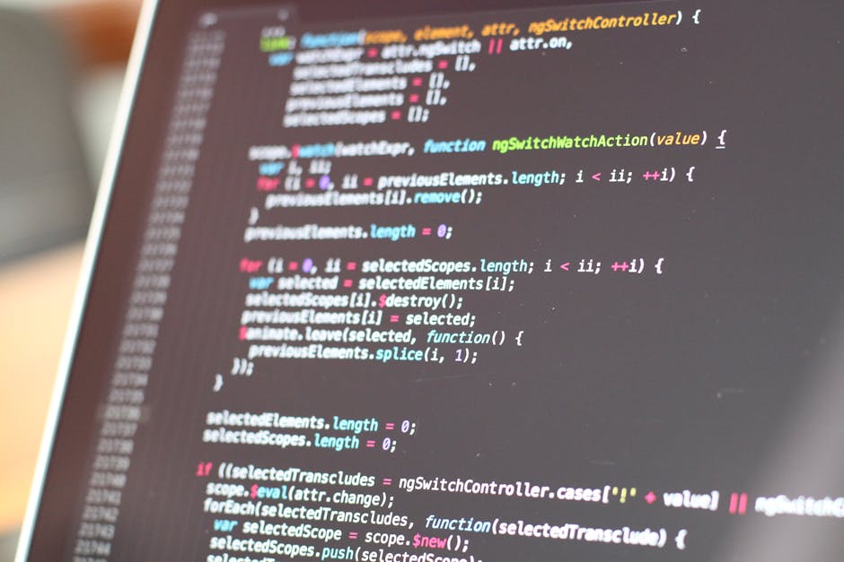 A close-up image of a computer screen displaying lines of colorful code, including sections of JavaScript functions and syntax highlighting in colors such as blue, pink, green, and yellow. The code ap